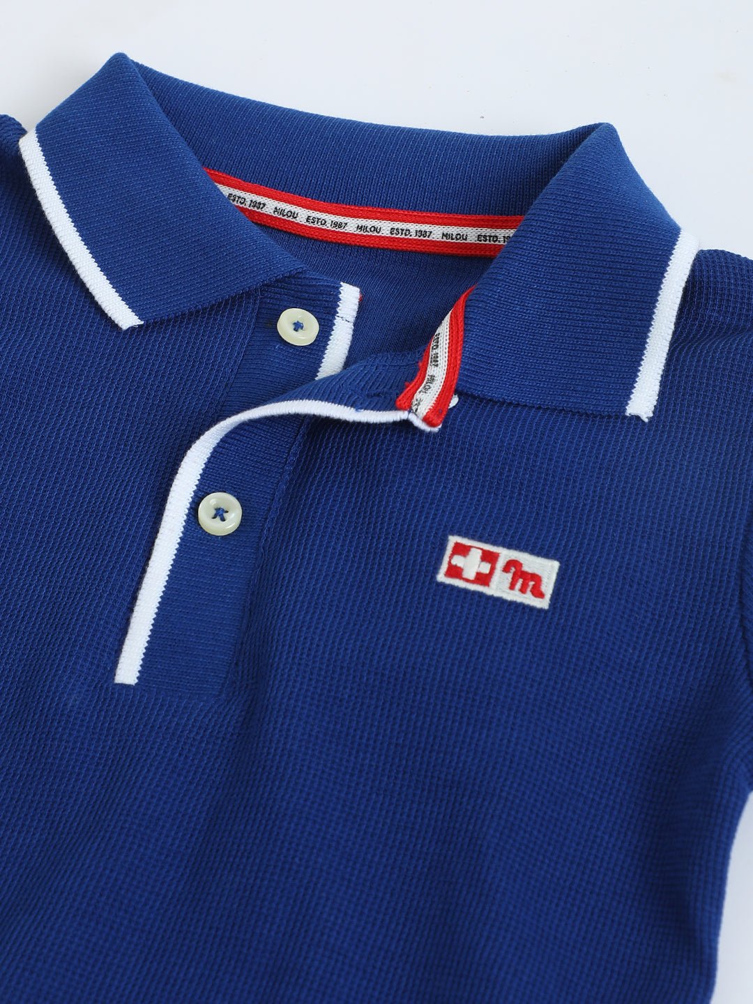 Boys Electric Indigo Piqué Polo T-Shirt | Kids Classic Polo - Milou - Care. The Swiss WayPolo