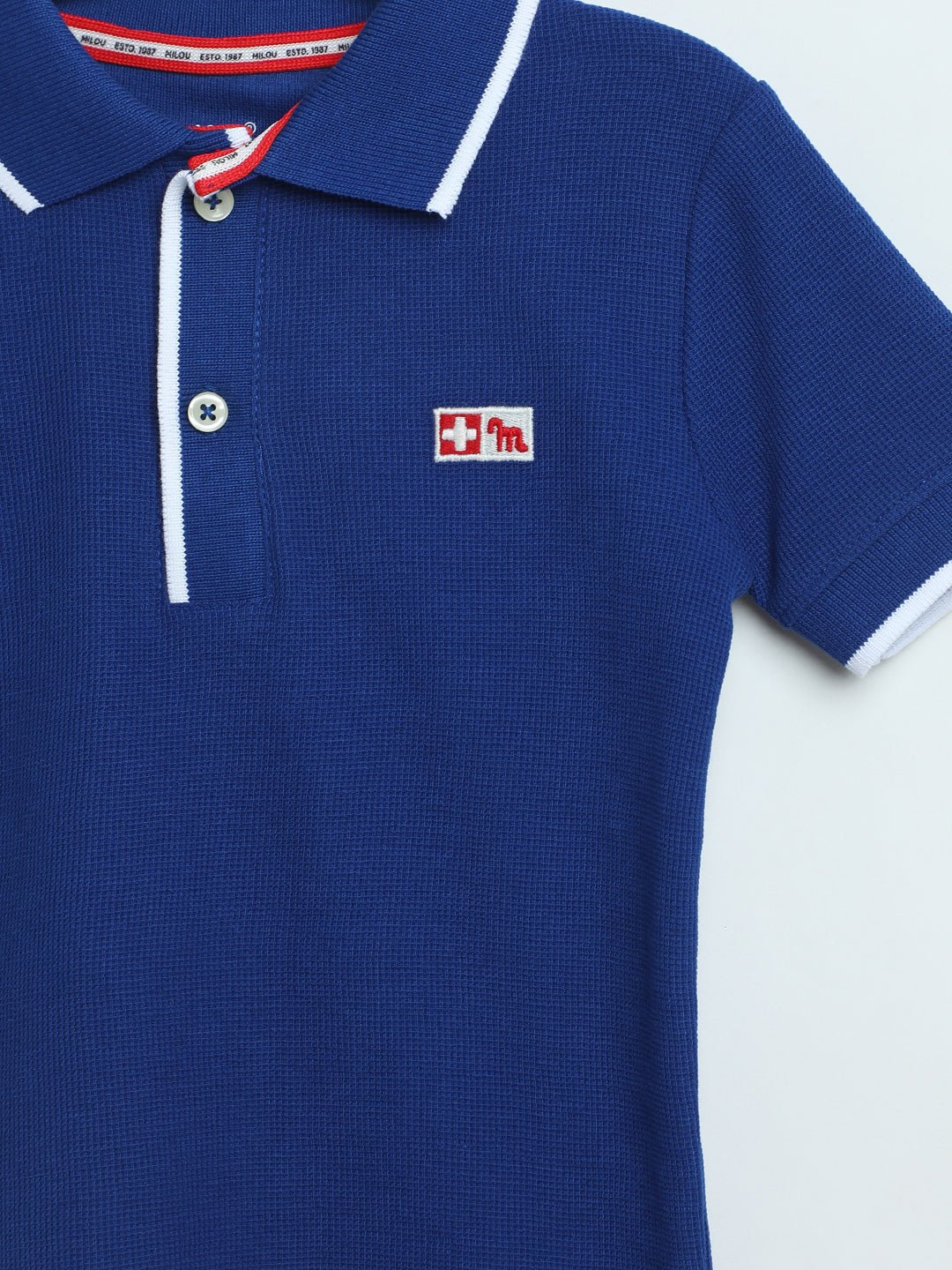 Boys Electric Indigo Piqué Polo T-Shirt | Kids Classic Polo - Milou - Care. The Swiss WayPolo